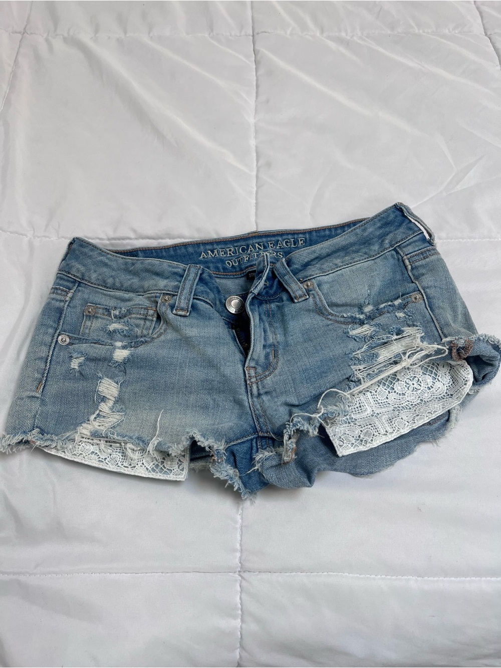 American Eagle Outfitters Light Blue Distressed Denim Lace-Trim Shorts